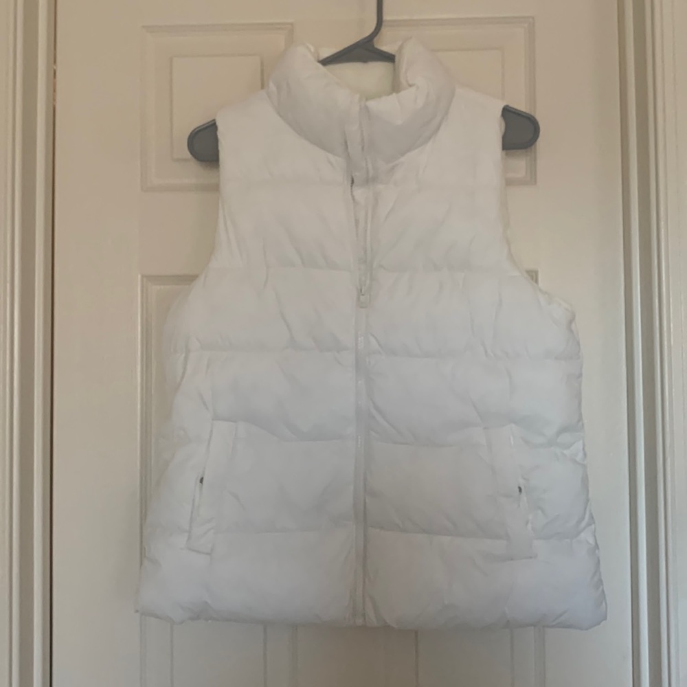 White Old Navy puffer vest
